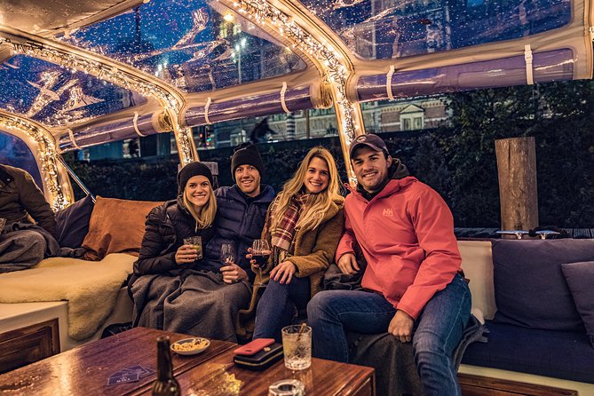 Amsterdam 2-Hour Evening Cruise With Live Guide and Bar - The Rijksmuseum and NEMO from the water