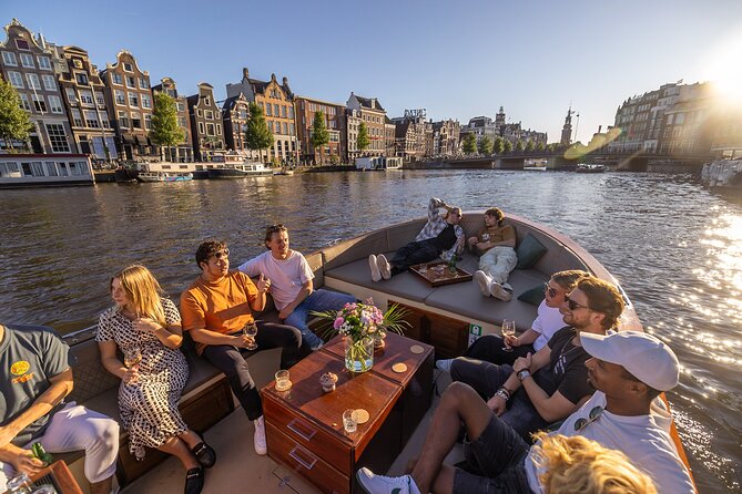 Amsterdam 2 Hour Small-Group Canal Cruise with Dutch Snacks & Bar - Anne Frank House and Westerkerk from the water