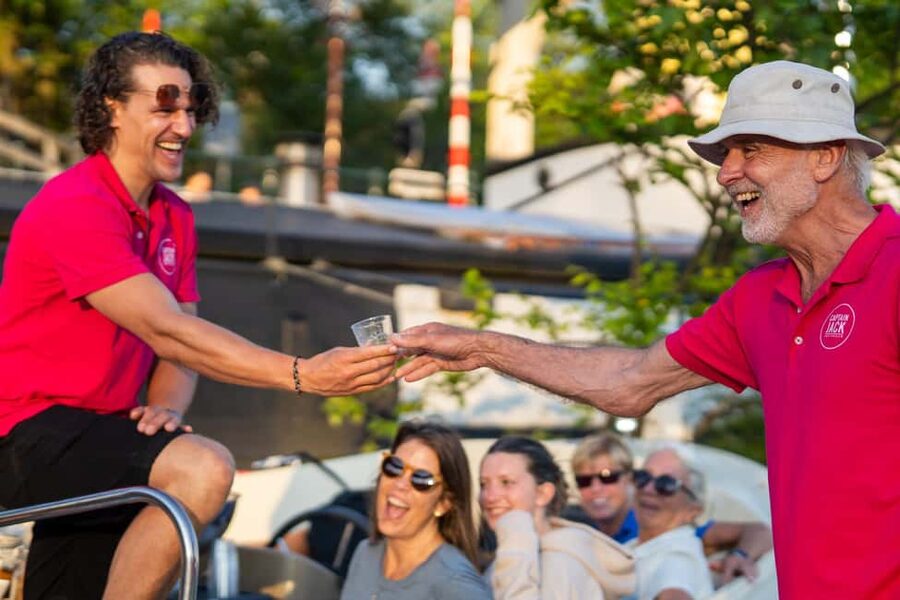 Amsterdam: 90 min Cosy Canal Cruise w. Bar & Snacks on board - Drinks, Dutch snacks, and the all-inclusive choice