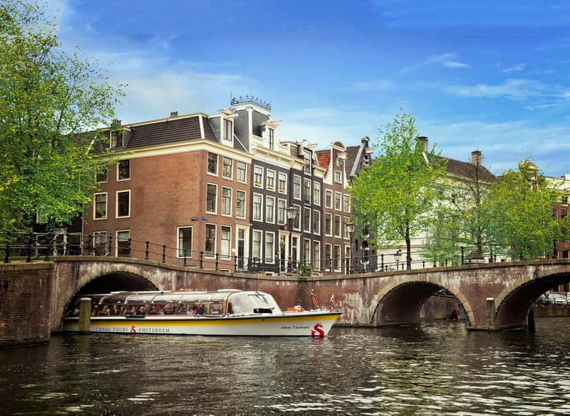 Amsterdam: City Centre Canal Cruise & Free Flower Cocktail - The boat, roof, sound, and comfort