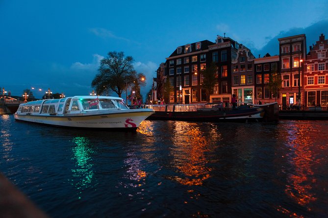 Amsterdam Evening Cocktail Cruise with snacks - Amsterdam after dark, served with a cocktail