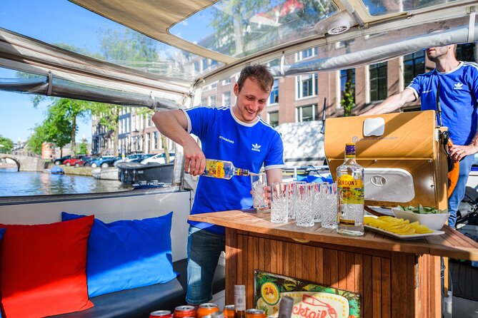 Amsterdam: German-speaking boat trip with bar on board - Magere Brug and the final stretch