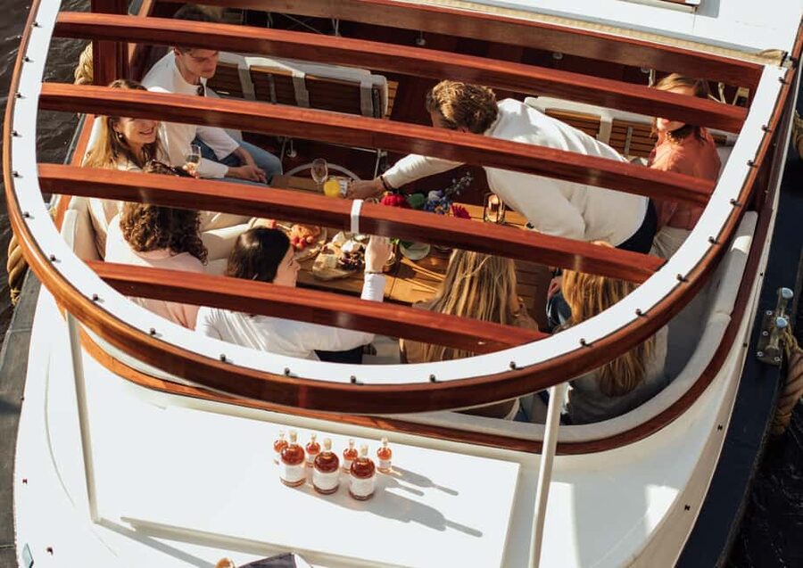 Amsterdam: Luxury Saloon Boat Cruise with Cocktails & Waffle - Drinks, snacks, and the boat’s social mood