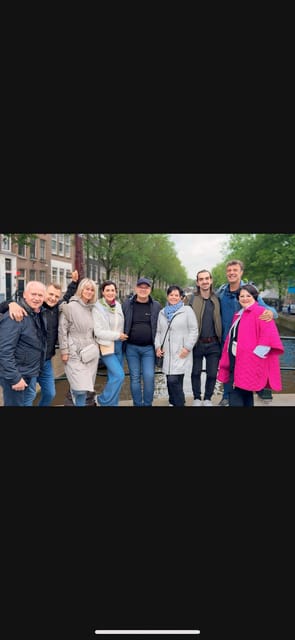 Amsterdam: Red Light Tour with Bar Visit + Free Drink and Stop at a Coffee Shop - Starting beside St. Nicholas Church