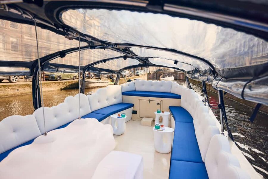 Amsterdam: Smoke & Cruise on covered Cannabis Boat With Bar - Oudeschans and the quieter canal views