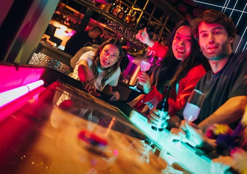 Amsterdam: The All Out - No.1 Activity Bar - Choosing between darts, karaoke, and shuffleboard
