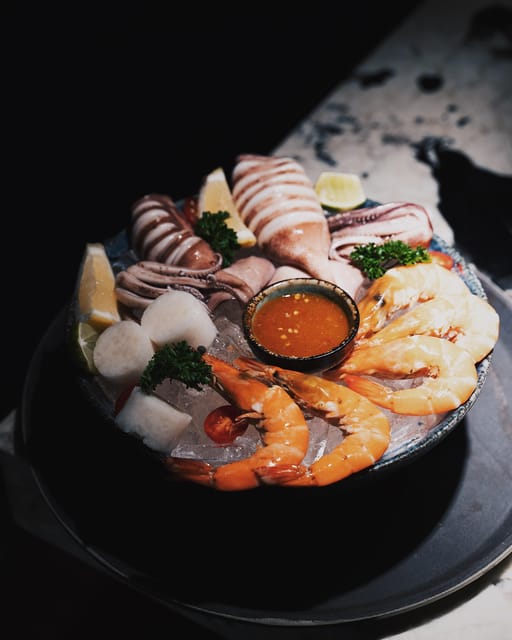 Bangkok: Dark Waters Rooftop Bar at Ten Six Hundred - Plush seating, cabanas, and lounge chairs
