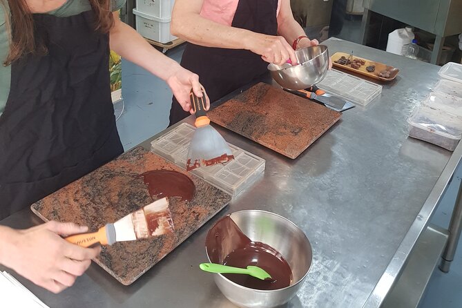 Become a Chocolate Master! Chocolate Bar Workshop in Paris - Filling molds and choosing toppings
