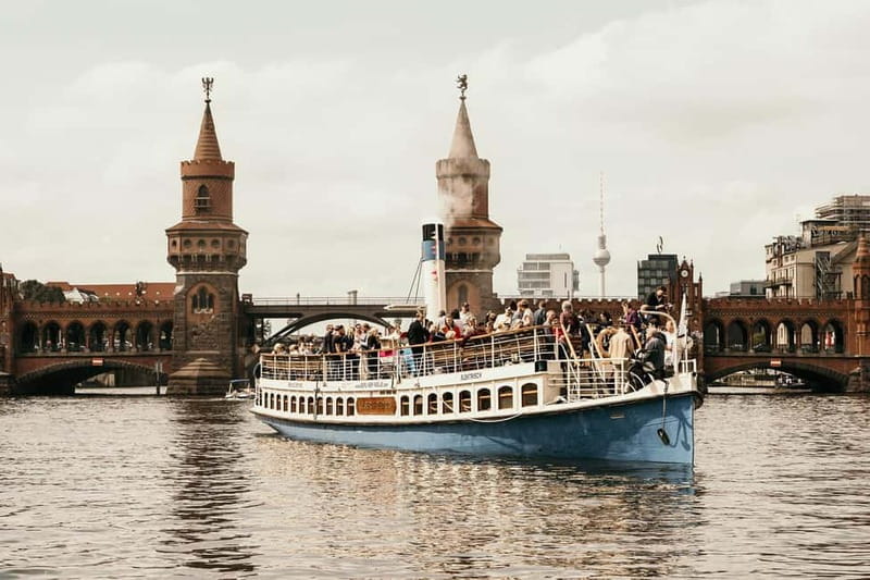 Berlin's Wild East: Nightlife & Counterculture Boat Tour - A bar, umbrellas, and the practical side