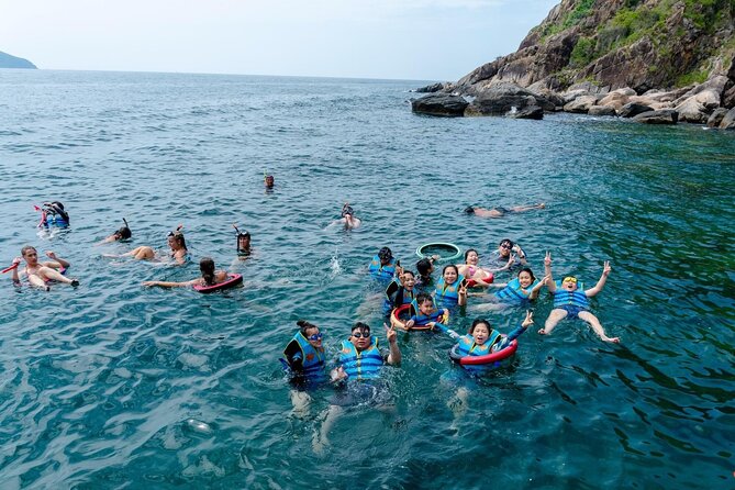 Coral Reef Snorkeling and Floating Bar Party from Nha Trang - The floating bar, cocktails, and giant slide