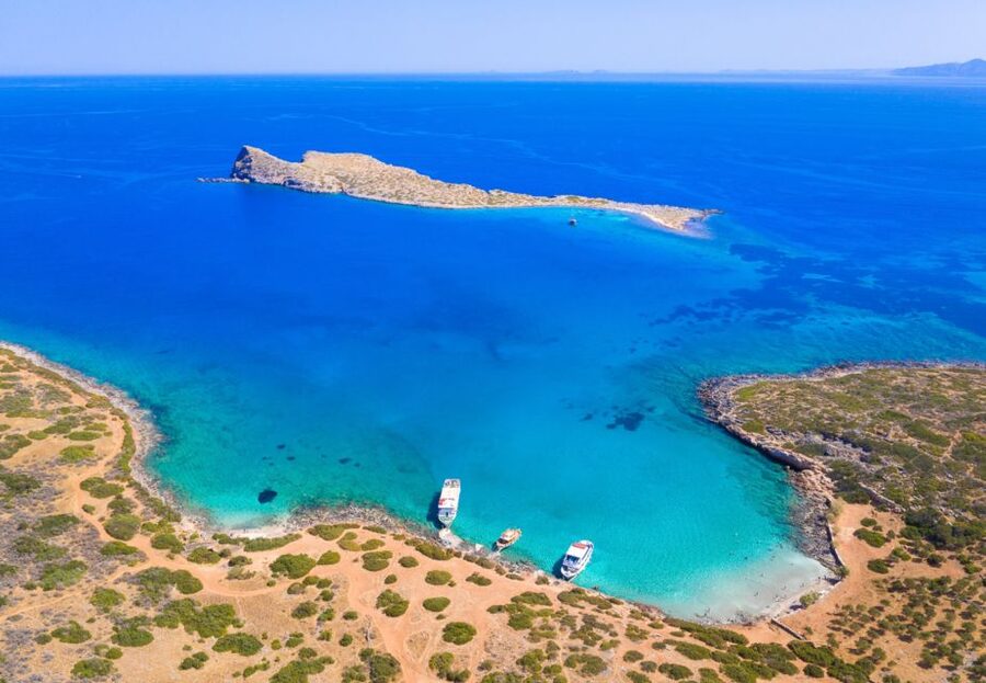 Crete: Mirabello Bay Cruise with Onboard Cocktail - Transport and timing across Crete