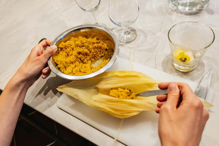 Cusco: Peruvian Cooking Class, Cocktails & Local Market Tour - Causa limeña turns potatoes into a work of art