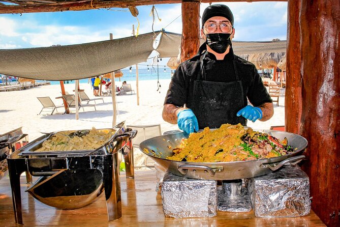 Discover Isla Mujeres: Catamaran, Snorkeling, and "Ice Bar" - Beach club lunch, with vegan choices