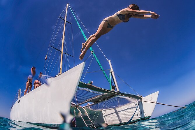 Discover Isla Mujeres: Catamaran, Snorkeling, and "Ice Bar" - Leaving Cancun by catamaran