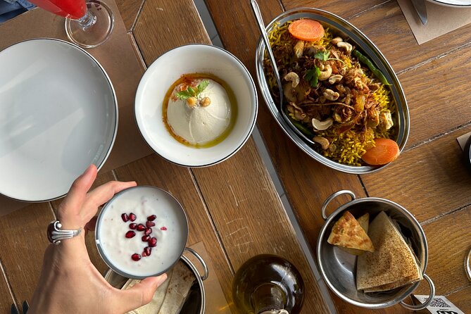 Dubai Secret Food Tours with Access to Burj Khalifa bar - Tasting Emirati food, Arabic staples, and Chinese dishes