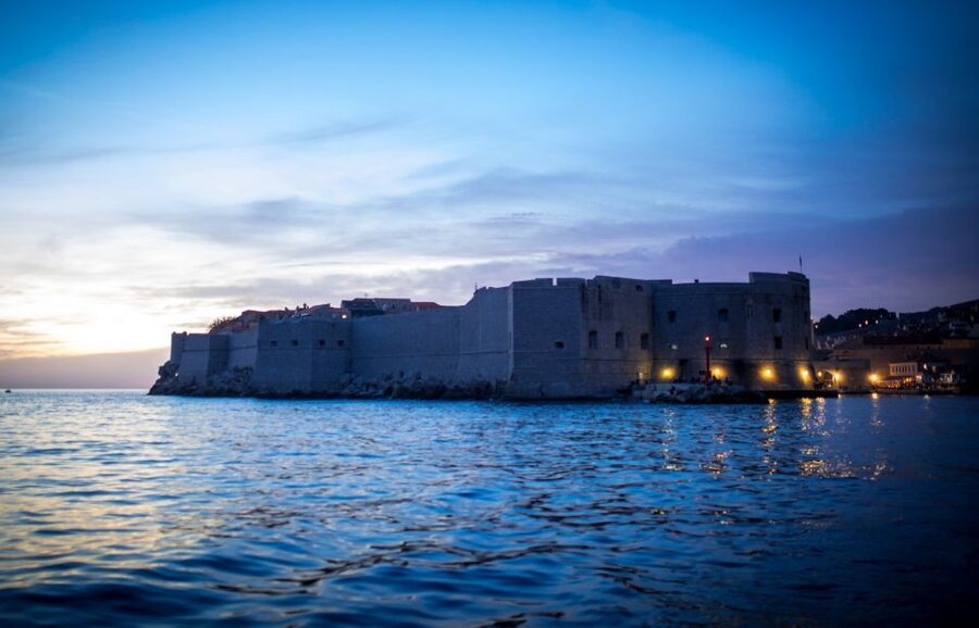 Dubrovnik: Panoramic Sunset Cocktail Cruise Around Old Town - The first stretch past Dubrovnik’s City Walls