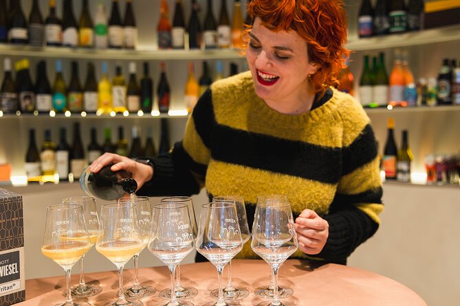 Four hour walking wine tasting tour of Manchester's best bars - Meeting Kel by the Emmeline Pankhurst Statue