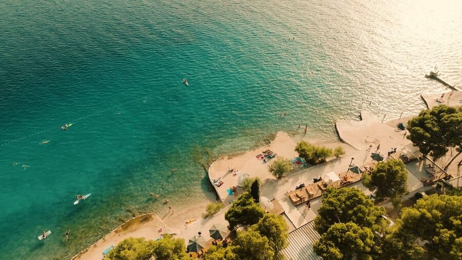 From Split: Brač Island Beach Bar and Pool Party - Sunbeds, cabanas, and swimming