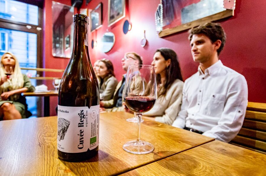 Krakow: Guided Wine Bar Tour with Tastings and Snacks - Walking through Old Town between tastings