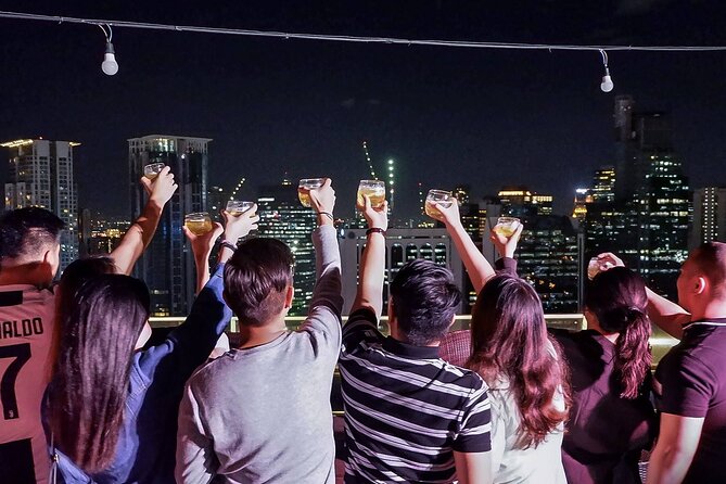 Makati: Music Clubs, Rooftops, and Go Go Bars Nightlife Tour - A rooftop start above Makati