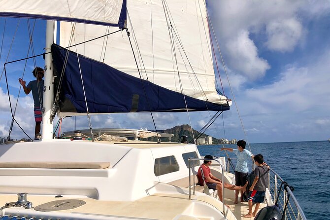 Moana’s Swim’n’Sail Cocktail Cruise Along the Waikiki Coast - Drinks, music, and the mood onboard