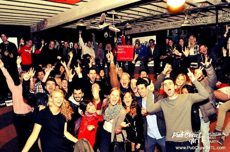 Montreal: Guided Bar Crawl with Free Shots and Club Entry - Starting the night at a cozy Montreal bar