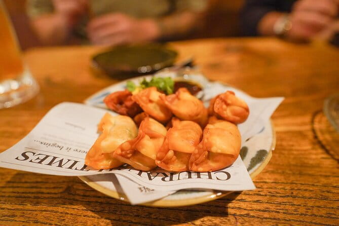 Naha Bar Hopping Tour in Okinawa - Stop two: the main Okinawan meal