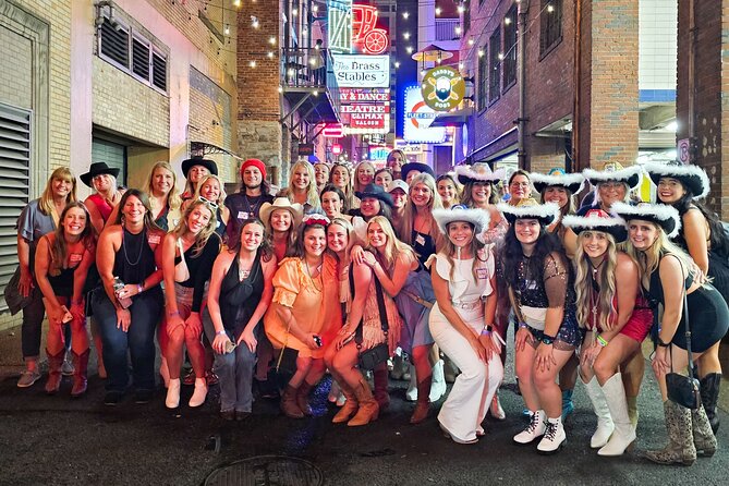 Nashville Bar Crawl with VIP Club Entrance and Bonus Shots - Passing the Ryman and walking through Printer’s Alley