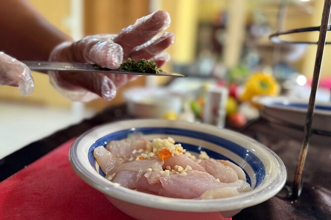 NEW! Authentic Bahamian Cooking and Cocktails with Transfers - Sitting down to eat what you helped prepare