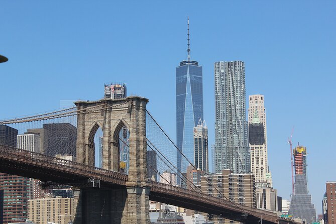 New York City Sunset Cocktail Cruise on Small Yacht - Passing the Brooklyn Bridge and lower Manhattan