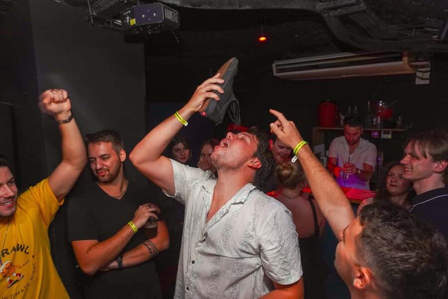Nice: Orange Bar Crawl with 5 Free Shots & VIP Club Entry - Stops two through four: games, deals, and a moving crowd