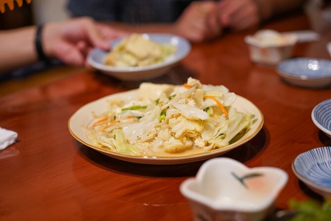 Okinawa Bar Hopping Tour with Sanshin Live in Music Town Koza - Stop two: Nakanomachi and Koza’s local bar culture