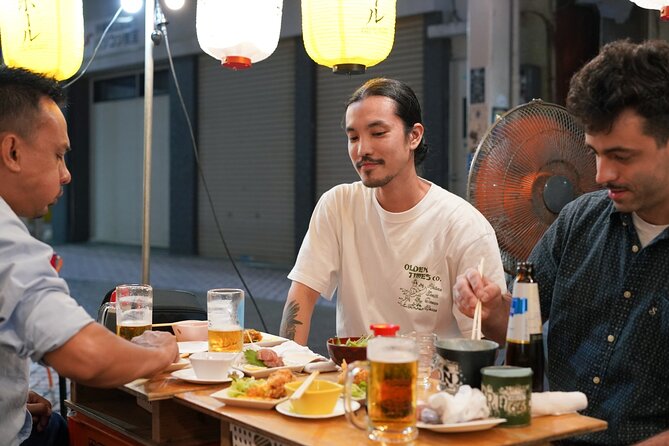 Okinawa Bar Hopping Tour with Sanshin Live in Music Town Koza - Stop one: Ichibangai Shotengai and the first toast