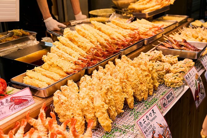 Osaka: 2-Hour Nightlife District Walking & Local Food Culture - The guide and group experience