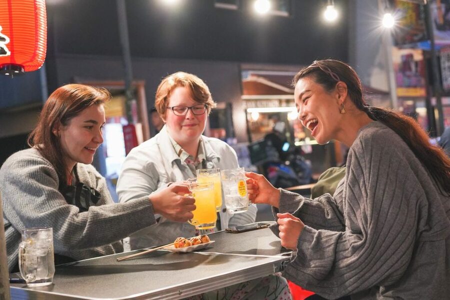 Osaka: Bar-Hopping Night Tour in Namba - Guides, group size, and the social side