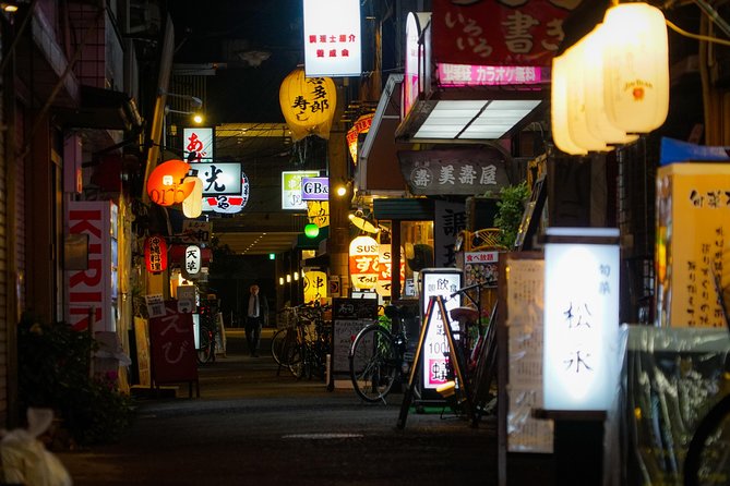 Osaka Bar Hopping Night Walking Tour in Namba (3 bars, 6 tastes) - The Glico sign and Osaka’s bright night face