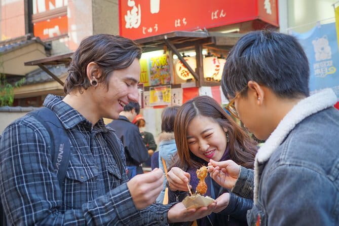 Osaka: Private Food Tour & Bar Hopping in Namba - Second food stop: okonomiyaki at Honke Otako Hozenji