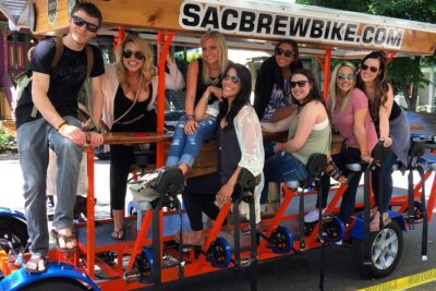 Pedal, Drink, and Bar hop through Sacramento on a 15 seat Beer Bike
