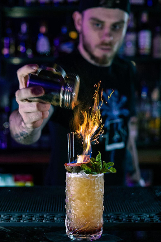 Premium Cocktail Class - Entering Ohana Tiki Bar on Dublin County’s purple-lit street
