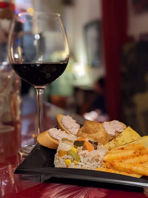 Rome: Wine and Food Tasting Experience at Speakeasy - Rione Monti gives the evening a useful Rome setting