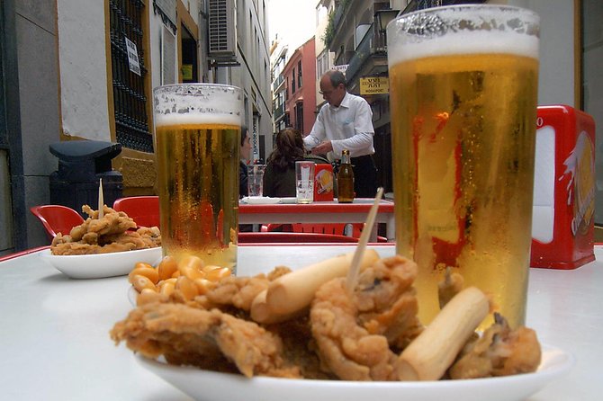 Sevillian tapas tasting on a bicycle (3 bars-3 tapas-3 drinks) - Key points to know before you book