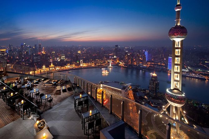 Shanghai Authentic Dinner and Night River Cruise with Rooftop Bar Hopping Option - Starting with dinner and local soup dumplings