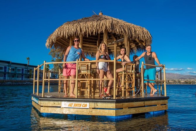 Tiki Boat - Clearwater - The Only Authentic Floating Tiki Bar - The route: shoreline views, harbor homes, and Gulf water