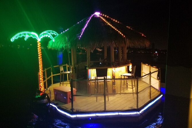 Tiki Boat - Downtown Tampa - The Only Authentic Floating Tiki Bar - Cruising past Tampa’s Riverwalk