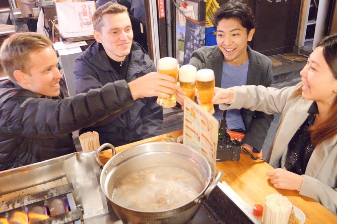 Tokyo Bar Hopping Tour in Shinjuku (All-You-Can-Drink + Dinner) - The Godzilla head and the walk between stops