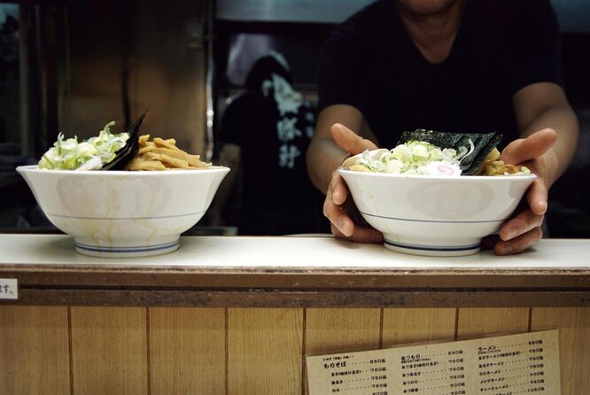 Tokyo Bar Hopping Tour in Shinjuku (All-You-Can-Drink + Dinner) - Kabukicho: food, lights, and a louder second stop