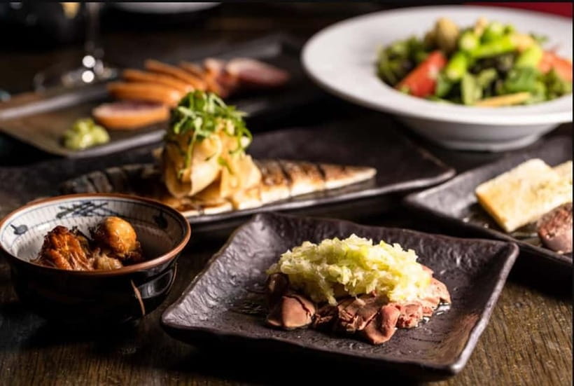 Tokyo: Izakaya Bar Experience at Kuuraku Ginza Reservation - Why the charcoal matters for the yakitori