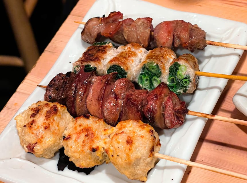 Tokyo: Night tour of bars and izakayas in Shinjuku - English / Spanish - Walking into Kabukicho’s neon streets