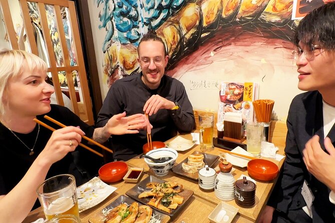 Tokyo: Shinjuku Bar Hopping & Night Walking Tour - Omoide Yokocho: lanterns, office crowds, and tiny tables