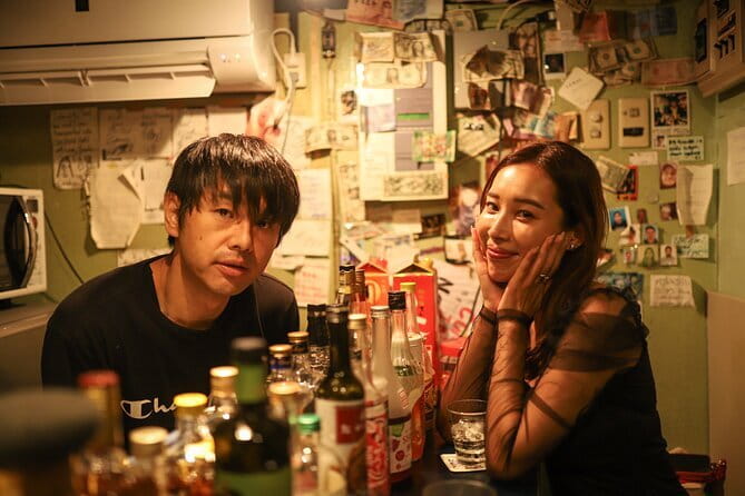 Tokyo: Shinjuku Hidden Japanese Bar Tour (Neon Light City) - Walking through Kabukicho under the neon